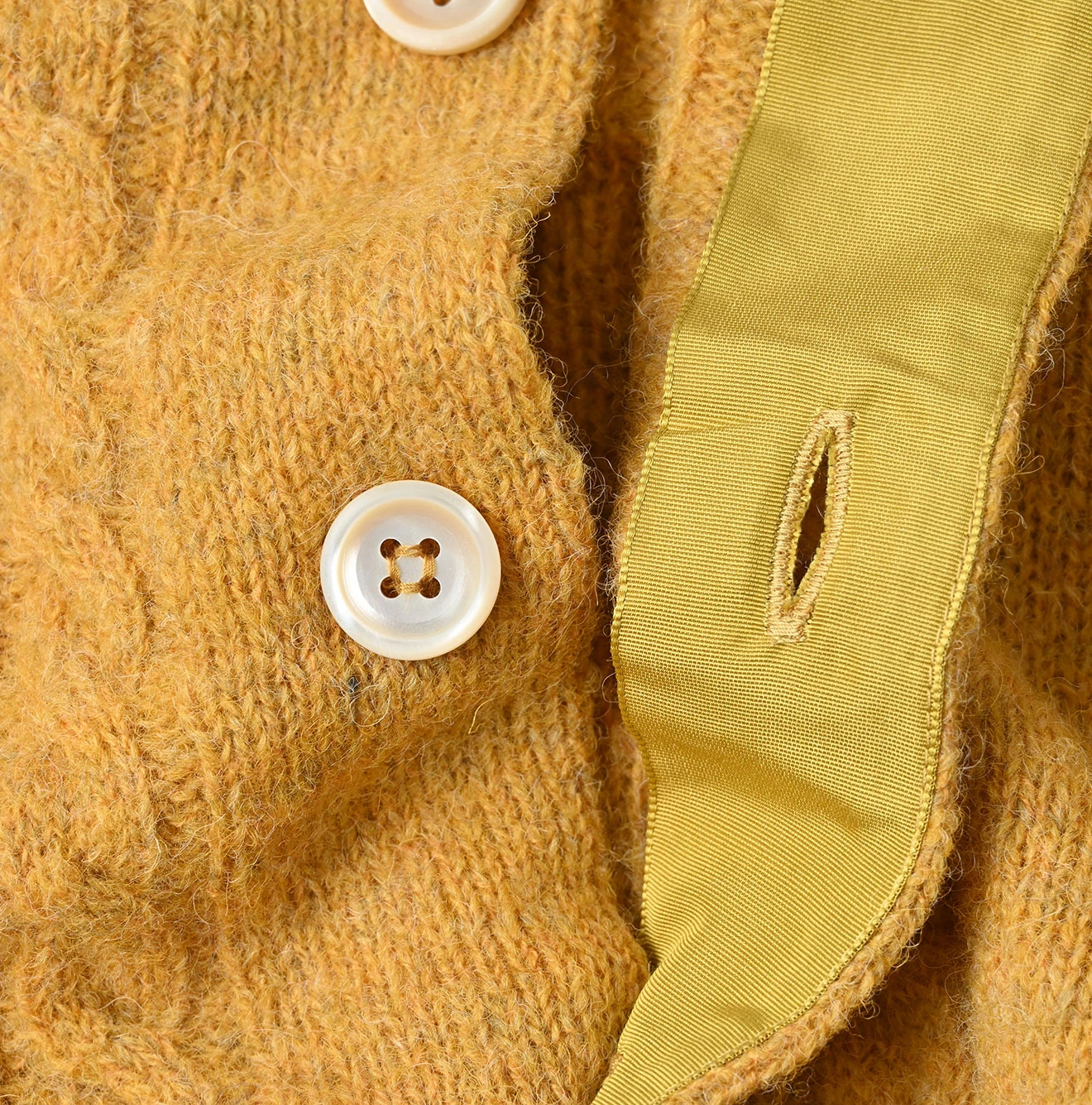 45R(フォーティファイブアール) |シェットランドケーブル縮絨のカーディガン