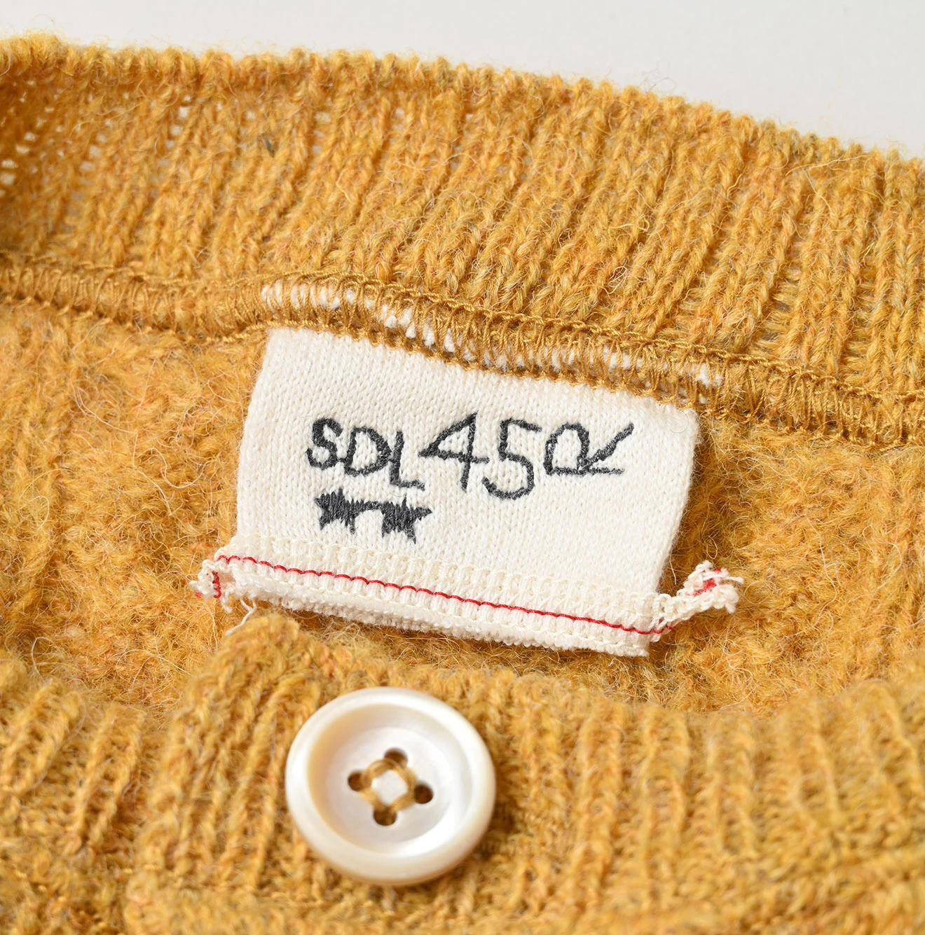 45R(フォーティファイブアール) |シェットランドケーブル縮絨のカーディガン