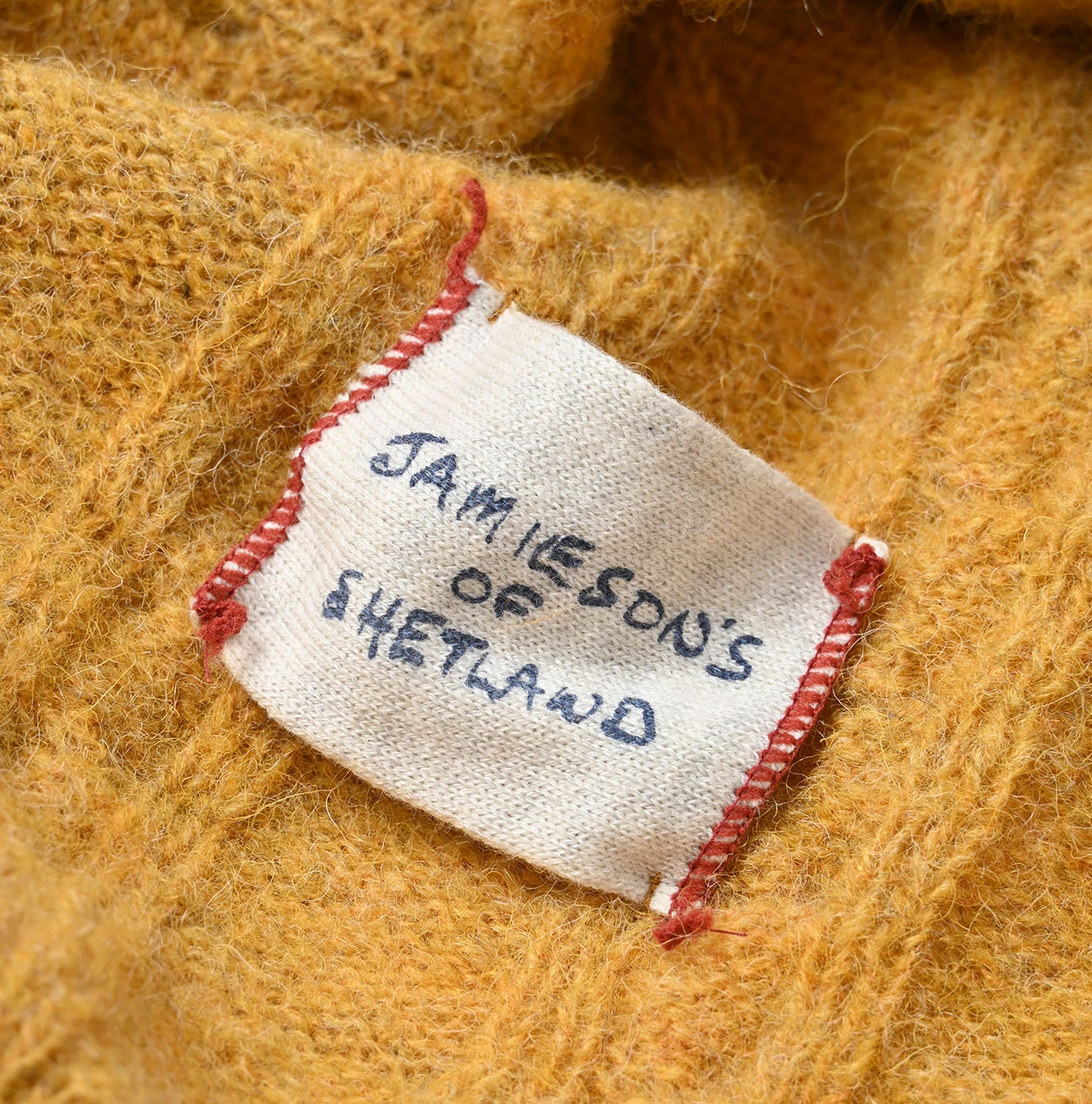 45R(フォーティファイブアール) |シェットランドケーブル縮絨のカーディガン